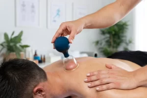 physiotherapist-performing-cupping-session